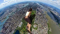 collage city mega clothed water buildings brunette lying_down skyscraper new_york_city central_park downward_angle