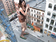 giantess collage feet cleavage buildings brunette hand shrunken_people streets flip_flops manicure megan_fox rooftop rooftop_view crushed_bus downward_angle lowerrider