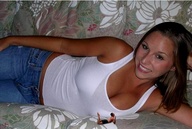 collage cleavage brunette lying_down shrunken_man looking_at_viewer sofa