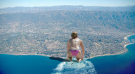 collage landscape mega butt beach ocean buildings wonderslug waves mountains back behind_view downward_angle crushed_ship jessica_biel