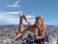 collage nude city mega blonde destruction barefoot soles lying_down hand skyscraper smoke sky toronto microjb dust nell_mcandrew