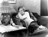 breasts collage monochrome clothed smiling short_hair sitting shrunken_woman lastcall41 looking_at_tiny