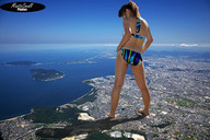 collage landscape city mega swimsuit barefoot ocean buildings brunette legs sky mastasmall aerial_view behind_view