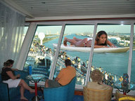 giantess collage swimsuit barefoot lying_down people dark_skin pier waterway lowerrider observation_deck surfboard