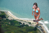 giantess collage landscape swimsuit beach barefoot cleavage ocean wet brunette wonderslug sand highway vehicles aerial_view downward_angle navel_ring
