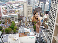 giantess collage city buildings climbing brunette smiling wonderslug skyscraper streets vehicles sneakers looking_at_viewer rooftop rooftop_view