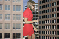 giantess collage brunette wonderslug dress short_hair sunglasses between_buildings victoria_beckham city_bus holding_vehicle