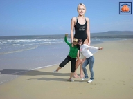giantess collage blonde beach barefoot ocean sand pedicure looking_at_viewer squeezemeflat