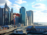breasts giantess collage city mega skirt brunette gloves wonderslug boots underboob supergirl belly skyscraper flying sky cape top belt hairband harbor dc_comics bare_midriff