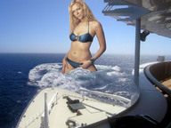 breasts giantess collage mega blonde swimsuit cleavage ocean wonderslug belly waves ships looking_at_viewer laura_prepon hands_on_hips wading observation_deck