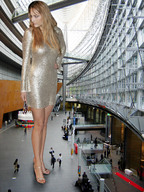 giantess collage small_man blonde long_hair high_heels wonderslug dress sandals legs people dangle grabbing indoors between_fingers hanging_on terminal leelee_sobieski cracked_floor