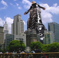 collage city mega blonde low_angle boots looking_down skyscraper people sky winzling point_of_view