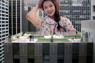 giantess collage city clothed buildings smiling asian shrunken_people looking_at_viewer rooftop
