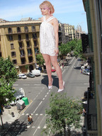 giantess collage blonde high_heels buildings wonderslug dress legs people standing streets vehicles