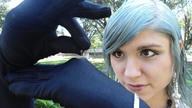 collage brown_eyes gloves face shrunken_man dangle outdoors between_fingers hanna looking_at_tiny peque