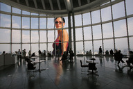 giantess collage black_hair shrunken_people sunglasses indoors point_of_view top