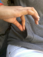 collage hand shrunken_man pocket dangle between_fingers peque