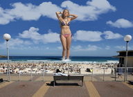 giantess collage blonde swimsuit beach cleavage ocean wonderslug sand sky sunbathers red_white_blue isabelle_drummond bondi_beach