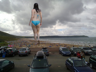 giantess collage mega black_hair butt swimsuit beach barefoot legs walking vehicles crowds docop jennifer_lawrence