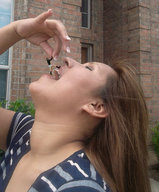 collage teeth brunette bbw shrunken_woman dangle pre_vore between_fingers manicure imminent_vore