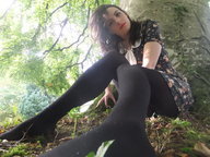 long_hair brunette tights dress legs nylons outdoors floor_view point_of_view looking_at_viewer make_up