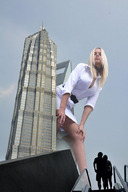giantess collage blonde low_angle unknown_artist legs skyscraper point_of_view looking_at_viewer