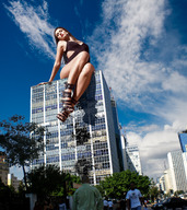 breasts giantess collage mega buildings low_angle wonderslug sitting legs looking_down streets straps clouds sky jessica_alba point_of_view looking_at_viewer sitting_on_building são_paulo