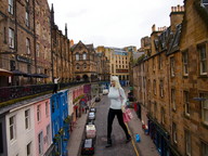 giantess collage small_man blonde buildings town streets vehicles between_buildings balcony zed782 looking_at_tiny date_with_a_giantess