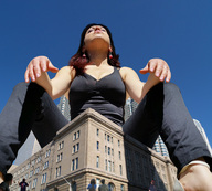collage mega black_hair destruction cleavage high_heels buildings sitting unaware onlookers sky black_pants earrings top giulio_10 sunning_herself