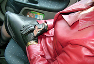 gentle collage handheld sitting shrunken_man leather_skirt leather_jacket pleading leather_gloves car_seat