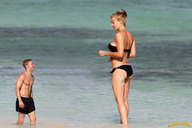 collage size_difference swimsuit clothed beach looking_down tattoo wading lowerrider looking_at_tiny swim_trunks