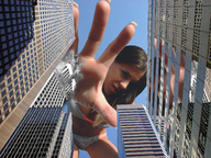 giantess collage city destruction finger brunette low_angle wonderslug hand reaching giantess_katelyn skyscraper sky point_of_view looking_at_viewer navel_ring