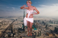 giantess collage landscape city mega blonde barefoot bra skirt short_hair burj_khalifa skyscraper tower sky top looking_at_viewer hairband dubai makeshift_clothing