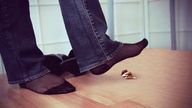 collage feet jeans nylons shrunken_woman floor raised_foot imminent_crush stocking_feet