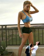 collage blonde large_breasts clothed cleavage bra shrunken_men short_shorts looking_down standing railing jordan_carver
