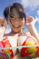 gentle collage black_hair large_breasts swimsuit cleavage water asian shrunken_man sunny looking_at_viewer sitting_on_breast water_line