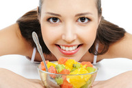 collage micro mouth teeth brunette brown_eyes face shrunken_people looking_at_viewer imminent_vore fruit_salad crushed_by_giantess