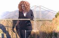 giantess collage bridge huge_breasts gloves red_hair mountains christina_hendricks