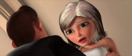breasts growth giantess white_hair blue_eyes susan brunette ginormica short_hair mini_giantess wedding_dress cartoon looking_down indoors bride monsters_vs_aliens point_of_view church digital_render susan_murphy dreamworks derek