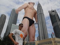 collage city giant sunglasses skyscrapers looking_up jockstrap