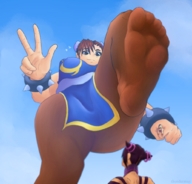breasts drawing giantess color large_breasts handheld brunette brown_eyes smiling street_fighter nylons looking_down chun-li juri point_of_view raised_foot imminent_crush thick_thighs armbands spikes peace_sign thundermagi