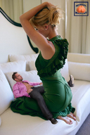 gentle collage blonde long_hair butt barefoot shrunken_man pants sofa green_dress squeezemeflat looking_at_tiny dress_shirt