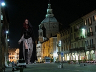 city skirt red_hair boots walking streets vehicles night corset gothic_giantess cape necklace hood