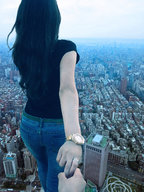 city black_hair long_hair butt jeans couple watch walking point_of_view holding_hand