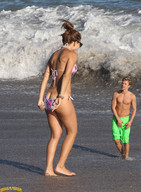 gentle collage butt swimsuit barefoot ocean shrunken_man waves sunglasses standing lowerrider butt_crack swim_trunks