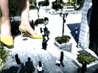 city mega black_hair long_hair clothed high_heels buildings asian foot_crush animation unaware onlookers cellphone afraid