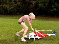 collage blonde helicopter reaching shrunken_man looking_down outdoors runswithferrets shrunken_helicopter digital_render