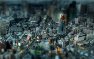 giantess city blonde long_hair skirt buildings standing alice_in_wonderland