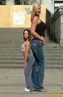 gentle blonde long_hair clothed jeans brunette amazon height_comparison top looking_at_viewer cassidy_heights