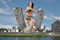 breasts giantess collage city destruction rampage buildings brunette wonderslug belly giantess_katelyn sky looking_at_viewer water_front leopard_print navel_ring